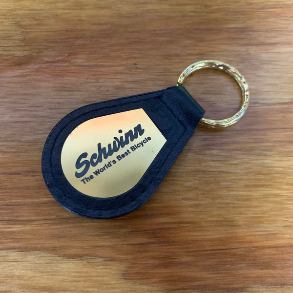 SCHWINN BICYCLE KEY CHAIN GOLD BLACK LEATHER THE WORLD S BEST BICYCLE NOS