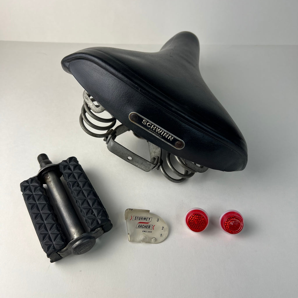 SEAT, LEFT PEDAL, CLEAR PLASTIC COVER, REFLECTORS