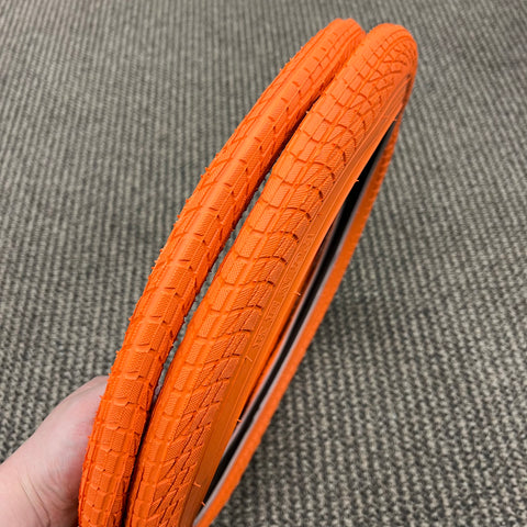 Orange bike tires on sale