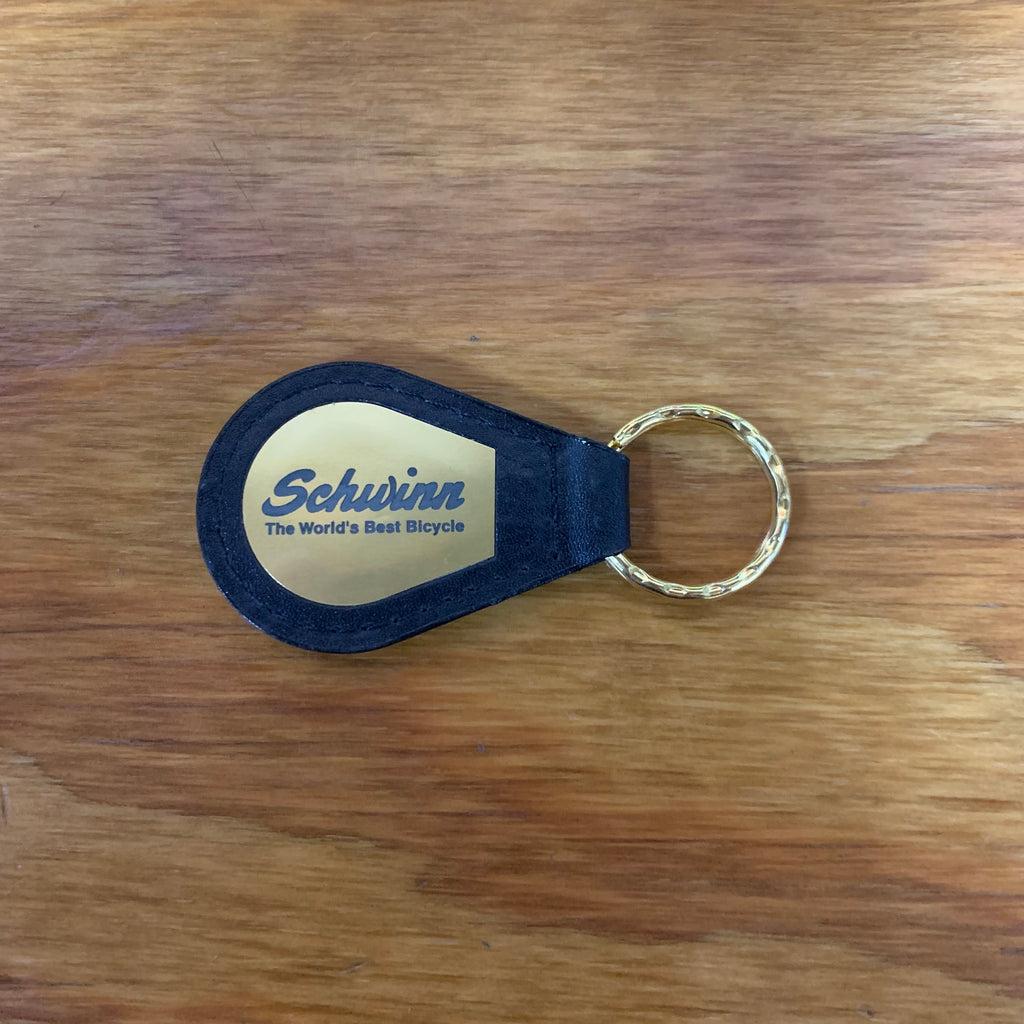 SCHWINN BICYCLE KEY CHAIN GOLD BLACK LEATHER THE WORLD'S BEST BICYCLE NOS