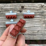 BRAKE SHOE PADS FOR SCHWINN CALIPER BIKE BRAKES LONGLAST VINTAGE RED NOS FOUR